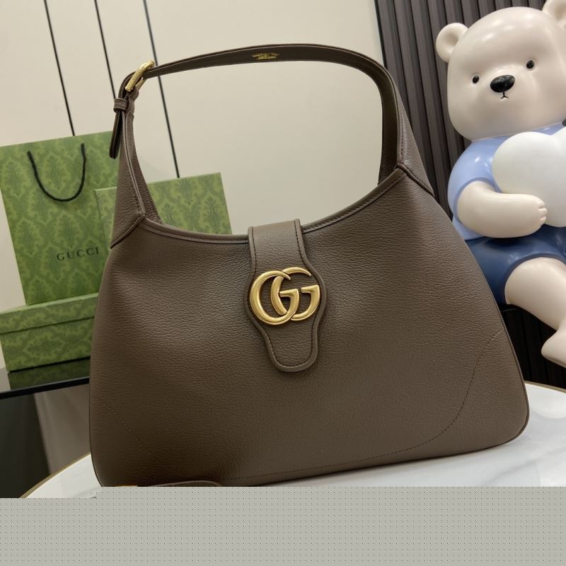 G*u*i top handle bags